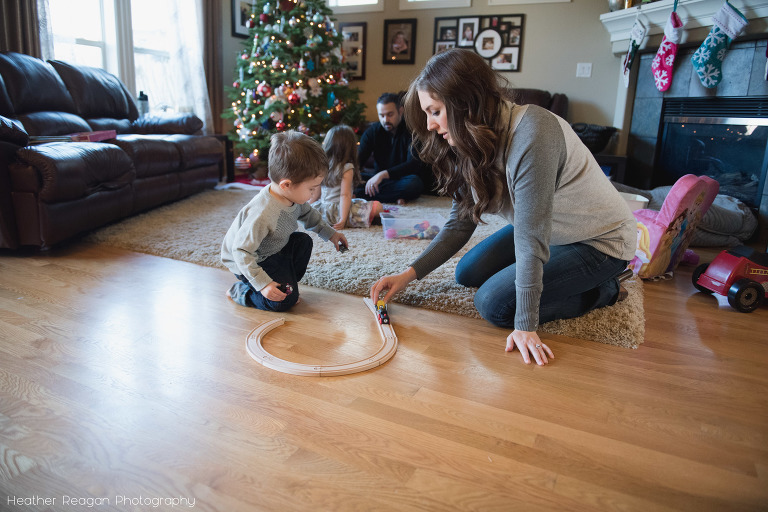 Trains in front of the Christmas tree, Tualatin documentary family photography