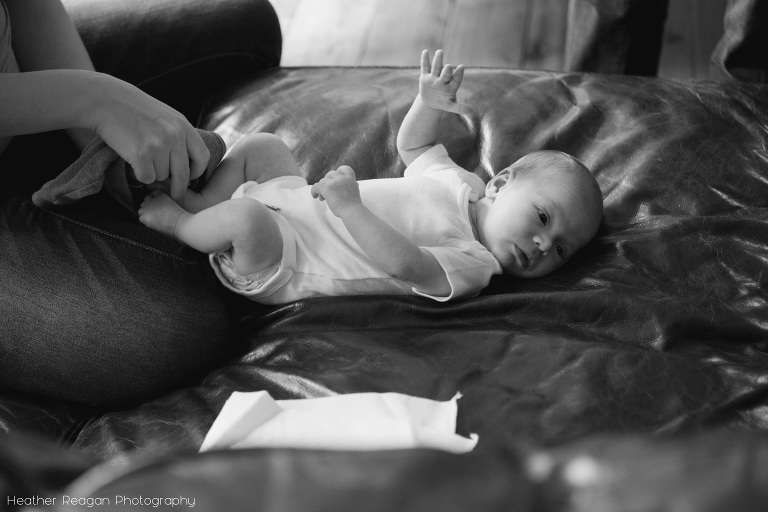 Newborn getting dressed - West Linn newborn photography - in-home documentary session