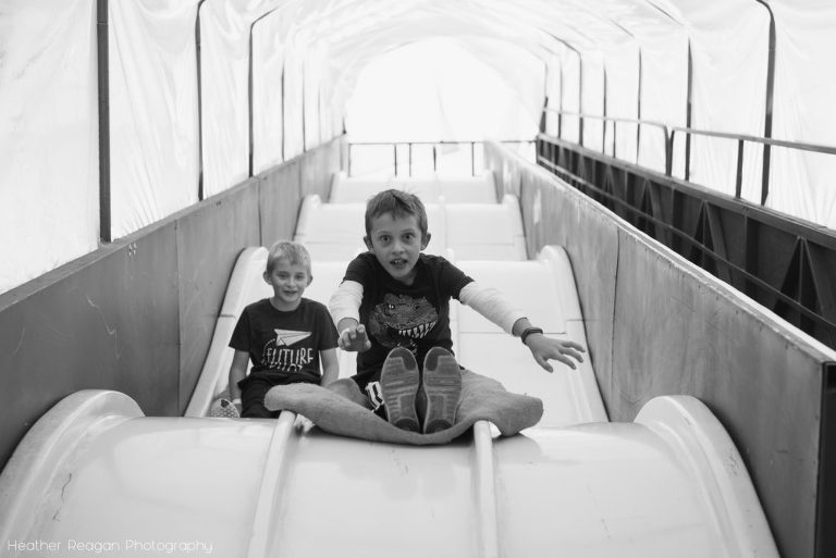 Lee Farms - Racing down the big slide!